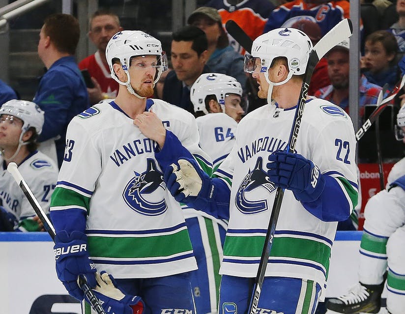 Daniel and Henrik Sedin's jerseys will be raised to the rafters