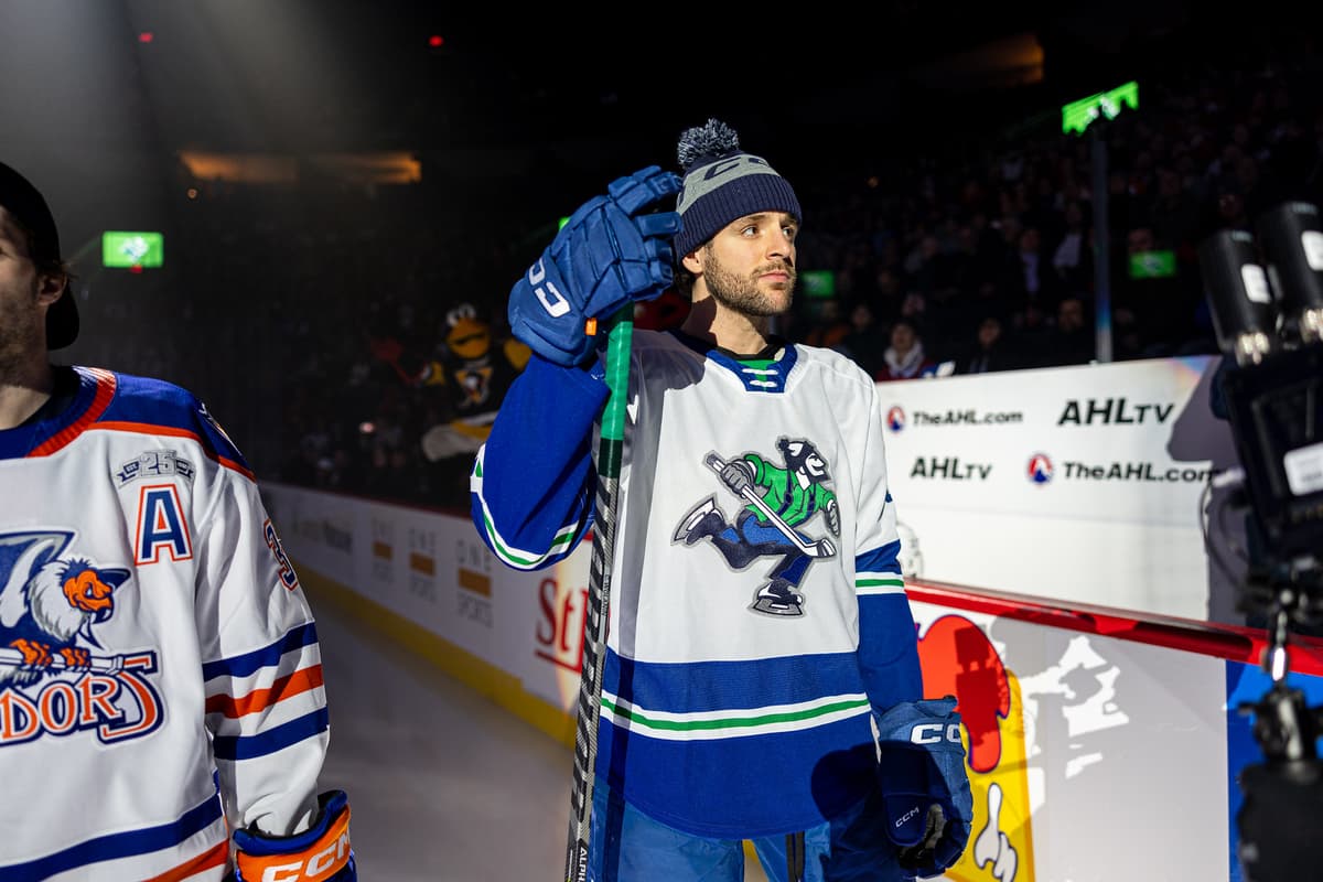 Vancouver Canucks recall Christian Wolanin from AHL, place Travis