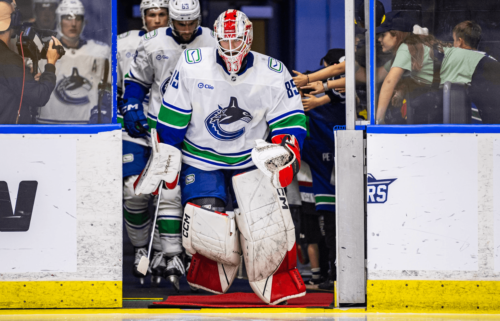 Goaltender Ty Young leads the Vancouver Canucks out at the 2024 Young Stars Classic.