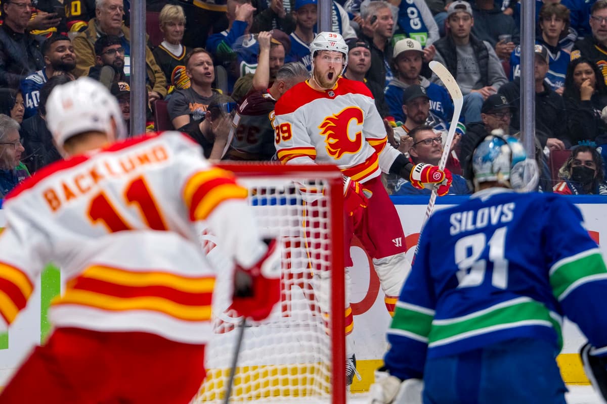 Instant Reaction: Canucks blow three goal lead, fall 6-5 to Flames in ...