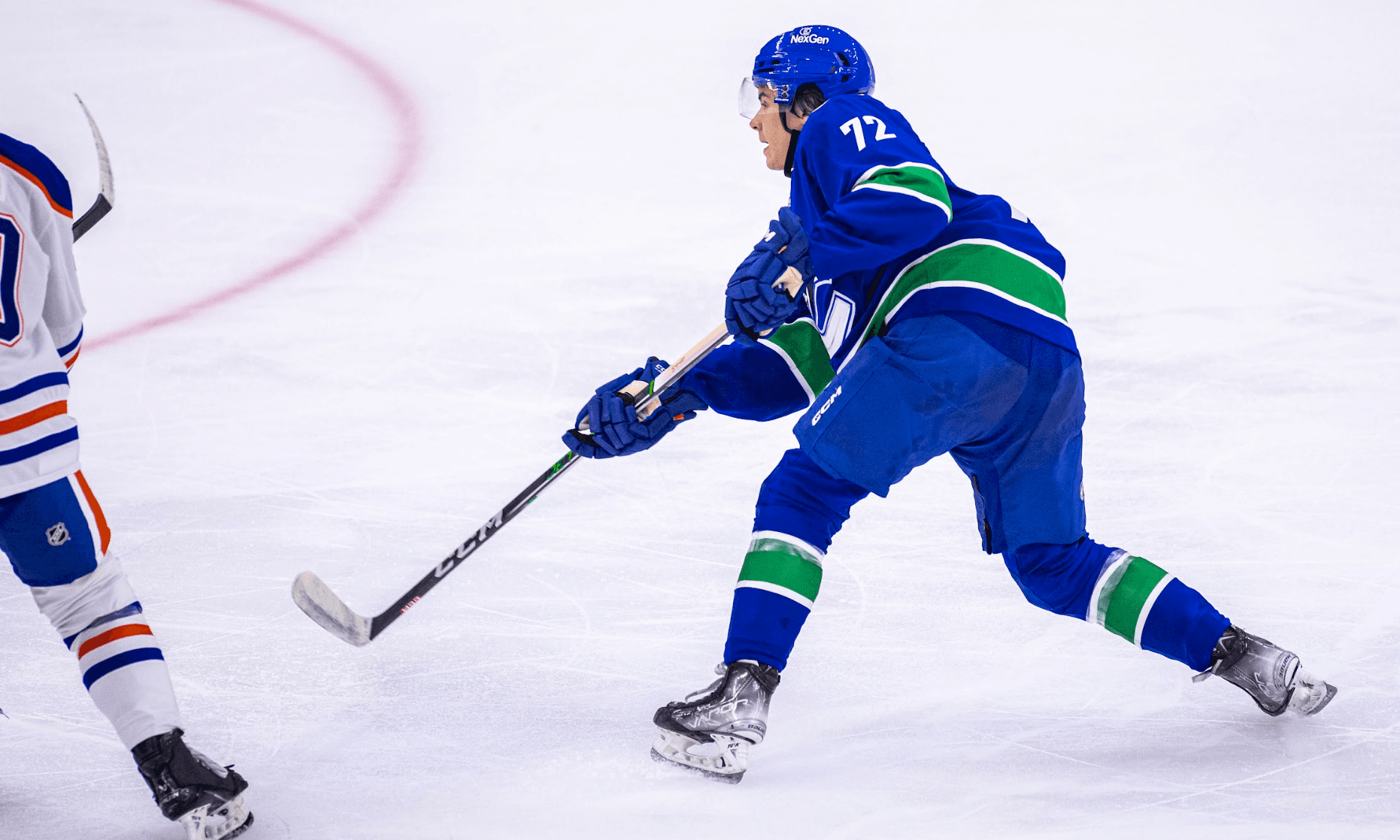 Vancouver Canucks prospect Anthony Romani takes a shot during his team's 2-0 victory over the Edmonton Oilers at the 2024 Young Stars Classic in Penticton, BC.