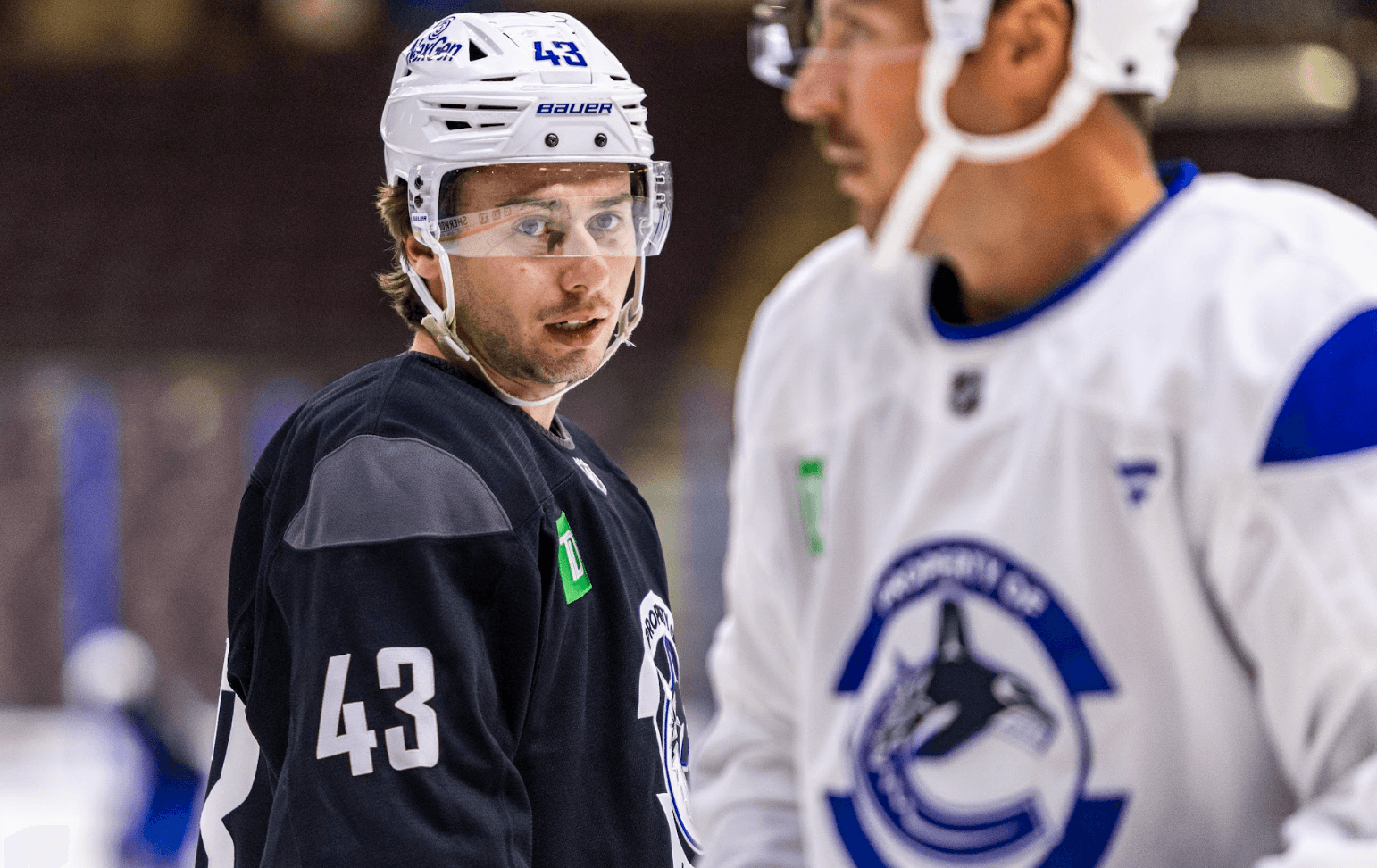 Quinn Hughes and JT Miller skate during day two of Vancouver Canucks training camp in Penticton, BC. Sep 19, 2024