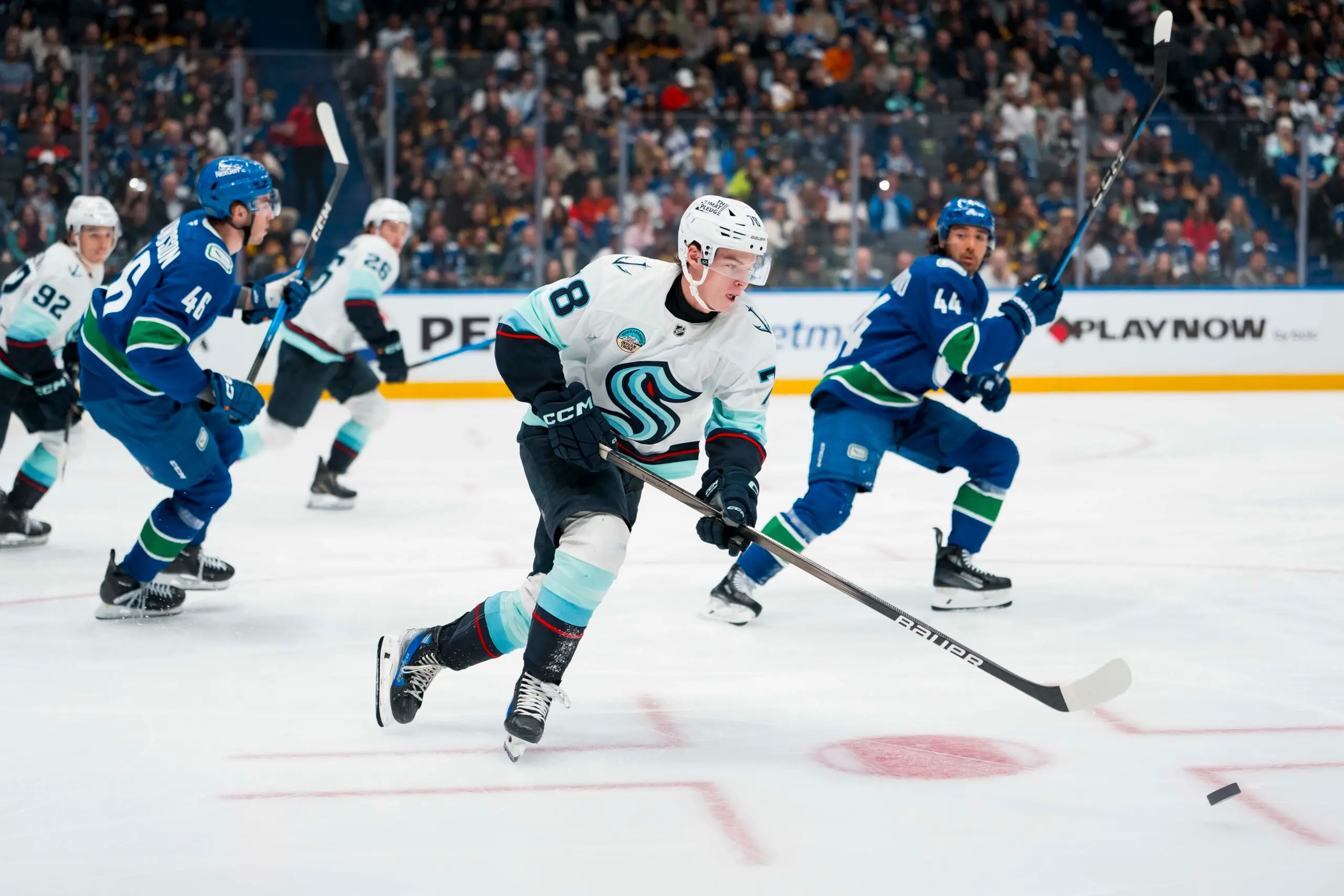 Seattle Kraken forward Oscar Fisker Molgaard (78) handles the puck against the Vancouver Canucks in the third period at Rogers Arena.